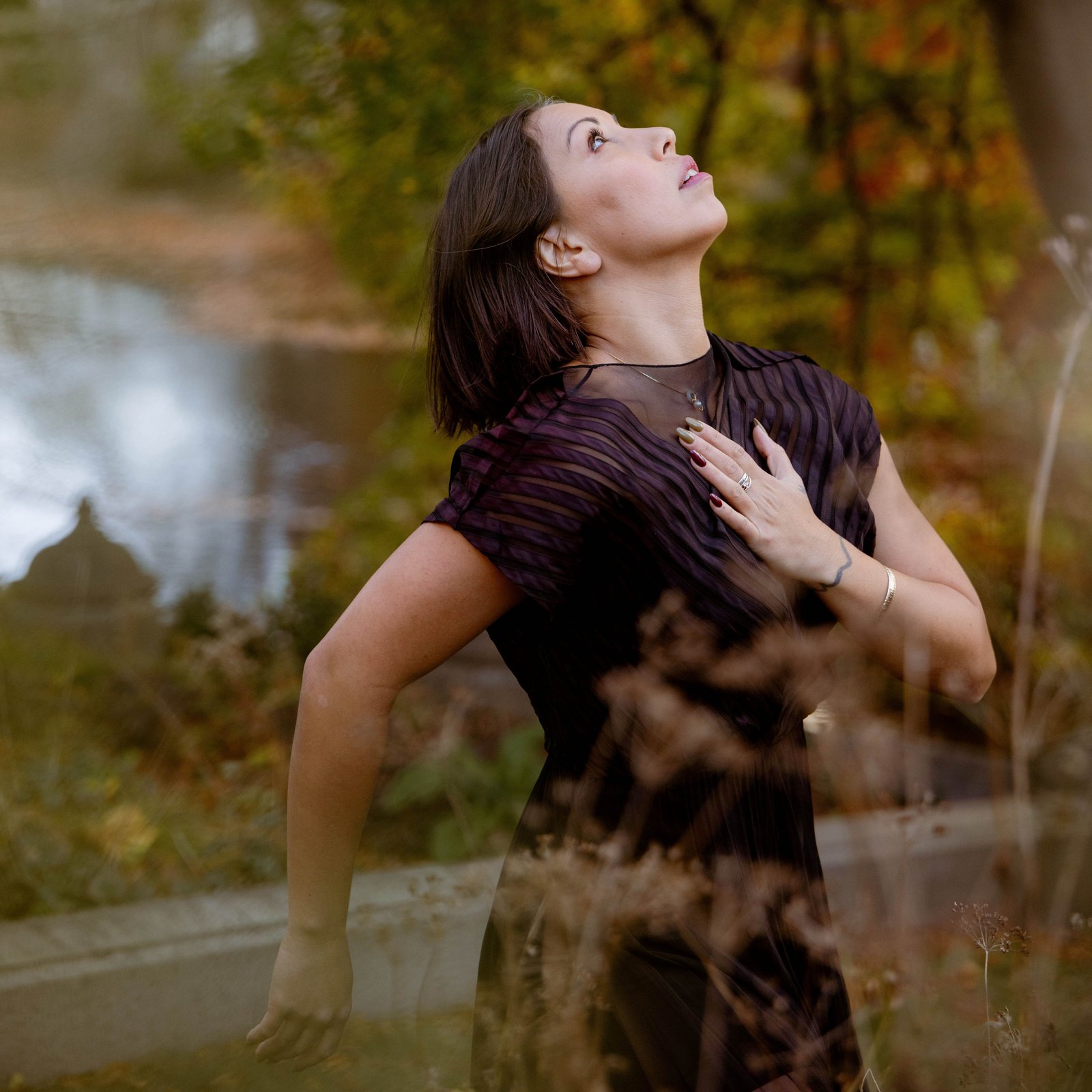 Woman dancing in Mt. Auburn Cemetery. Photo by Olivia Moon Photography
